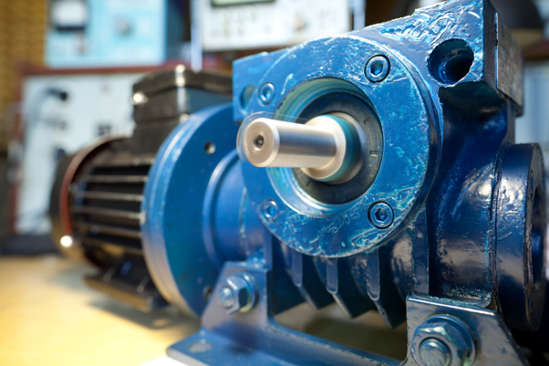 A close-up of an industrial hydraulic motor used in hydraulic system applications and analysis.